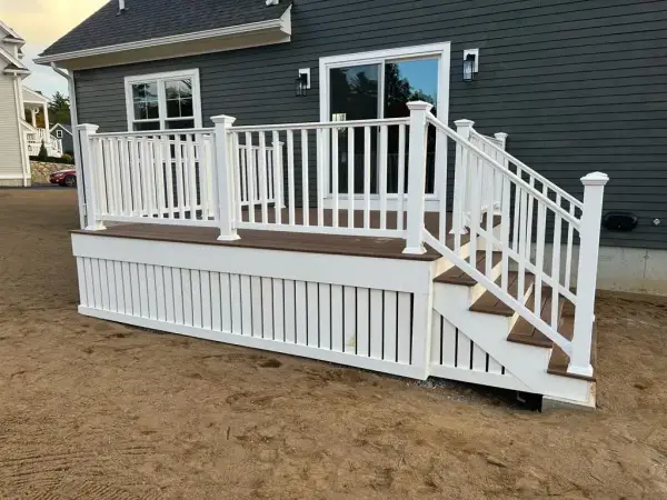 Close-up of integrated lighting and stair trim in Needham