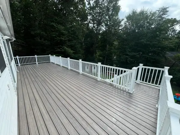 Custom outdoor dining pavilion and composite deck in Dover
